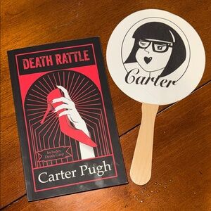 Death Rattle Book and Carter Fan